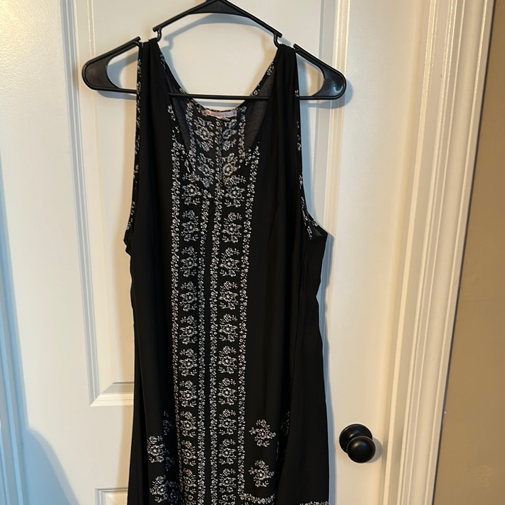 Black Sleeveless Dress with White Floral Pattern